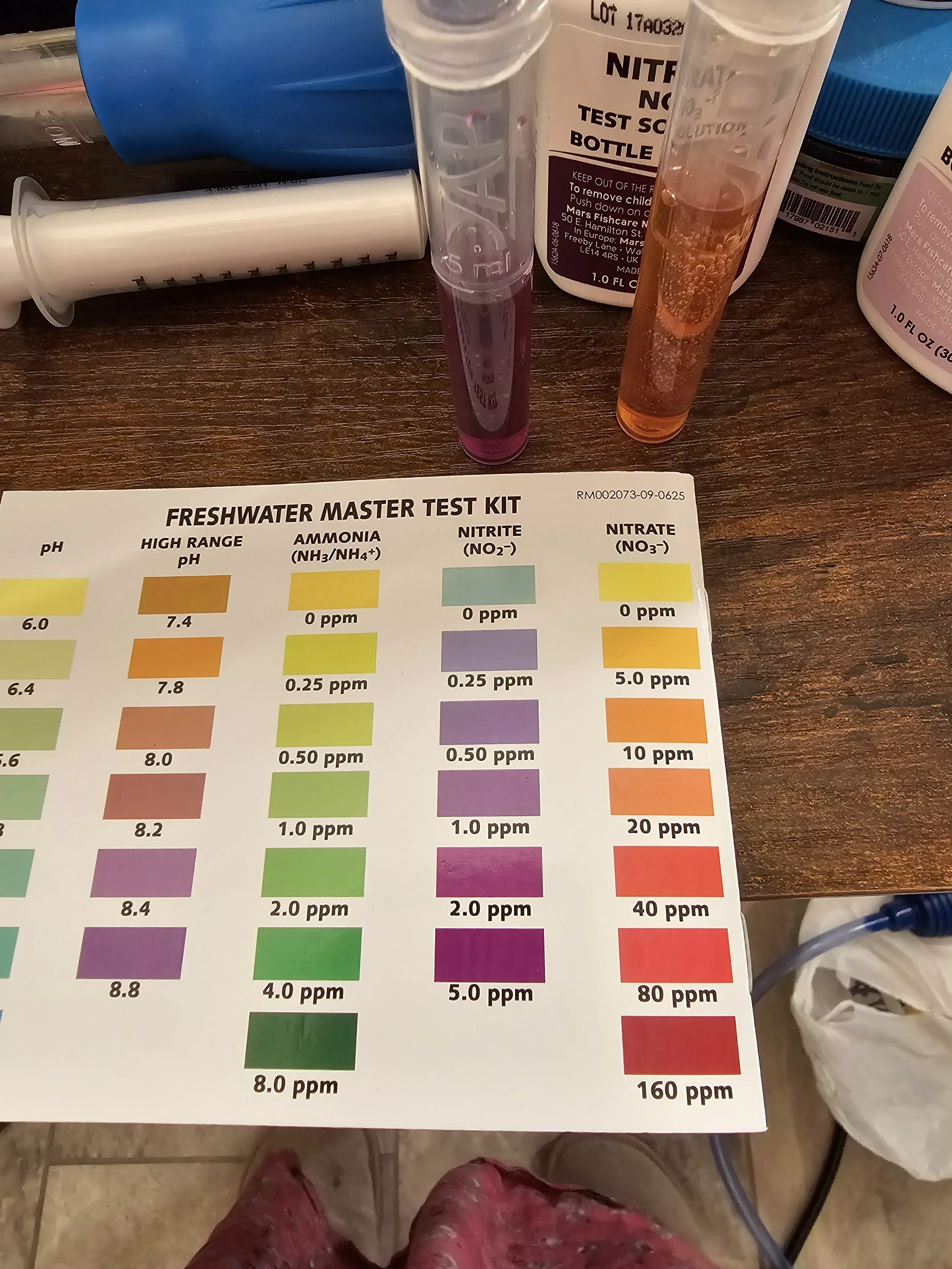 deep purple nitrite test tube indicates 2-5 ppm, orange nitrate test tube indicates 5-10 ppm